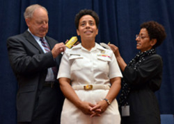 unapproachableblackchicks:   A black female naval officer has shattered a piece of the military’s glass ceiling. The Navy has promoted Michelle Janine Howard to the rank of three-star vice admiral, as she stepped into her new role as deputy commander