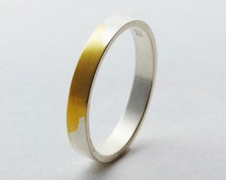  The best engagement rings are the ones that hold significance. Japan-based Torafu Architects coated a ring in a thin layer of silver that rubs off over time to reveal an 18-karat, gold wedding band beneath. By wearing each ring, the time shared between