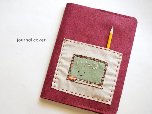 DIY Felt Composition Cover with Embroidered Pocket Tutorial from Wild Olive here. The embroidery pat