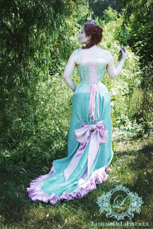 minalafleur:  More pictures of the Victorian natural form inspired outfit.  Mint/pink tea rose brocade corset and bra with pink silk trim.  The skirt, based on fan tail skirts from the 1870’s is lined organza with a woven floral pattern and heavy