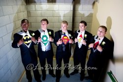 firefly-class:  thespianspider:  fuckyeahviralpics:  At one of my best friend’s wedding, we all decided to wear superhero shirts underneath our tuxedos. This is how one of the pictures came out.  I don’t need to say anything.  Weddings- you’re doing