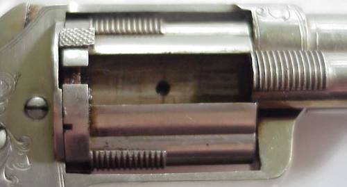 The Slocum Sliding Sleeve RevolverManufactured by Brooklyn Arms Co. from 1863 - 1864, the Slocum Sli