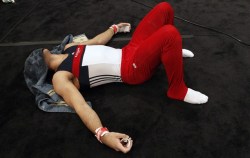 rosegym:  Danell Leyva resting with his magic towel. - 2012 American Cup 