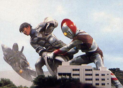 vintagehenshin:  ULTRAMAN 80 beating a Baltan so badly, his suit’s coming off.