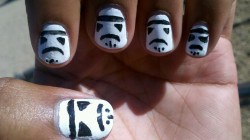 enchantedpsychopath:  My little sis did stormtroopers on my nails. Oh yeah!  It&rsquo;s the effort that&hellip;counts?!&hellip;I guess.