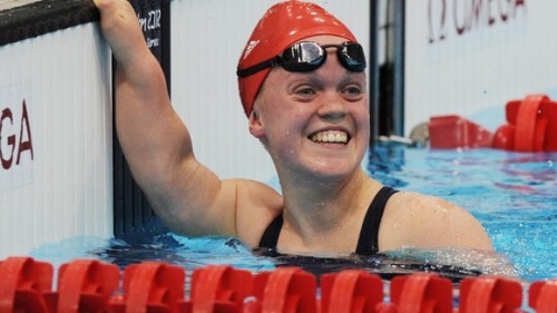 Ellie Simmonds successfully defends her S6 400m freestyle Paralympic title, setting a new world reco