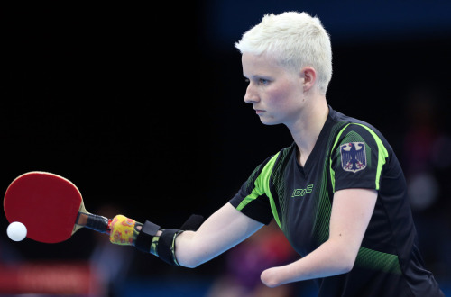 Here are some photos of German Paralympic table tennis player Stephanie.  She is is missing both han