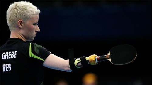 Here are some photos of German Paralympic table tennis player Stephanie.  She is is missing both han