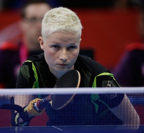 Here are some photos of German Paralympic table tennis player Stephanie.  She is is missing bot