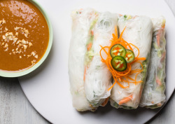 gourmet:  Spicy Summer Rolls With Peanut Sauce  We like to think of the summer roll as an elegant example of fast food: a salad packed into an edible container—in this case, paper-thin rice sheets—which results in something as beautiful to behold