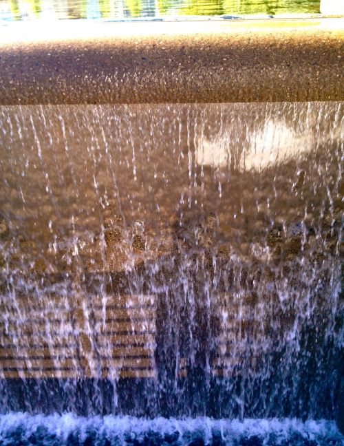 I found myself taking pictures today of the water feature in Wainborn Park. Dancing water, top, and 