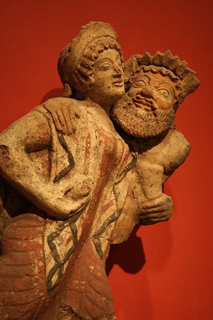 akalle:Roof ornament in the shape of a Dancing Maenad and a Satyr.Etruscan, Terracotta and pigment, 
