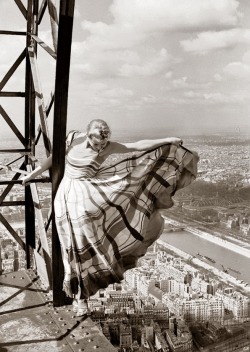arpeggia:  Lisa Fonssagrives wearing dress by Lucien Lelong in death-defying pose high atop the Eiffel Tower overlooking the city of Paris. Photo by Erwin Blumenfeld, French Vogue, May 1939 