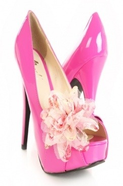 Fushia heels with flower.