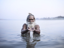 theviennatestament:  Vijay Nund Morning Puja - Joey L. Vijay Nund performing morning rituals in the Ganges River, the most sacred river in Hinduism. Varanasi, India  H