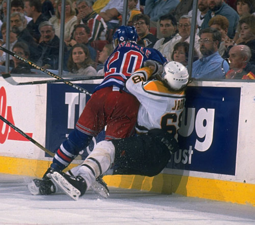 SI Photo Blog — Luc Robitaille pounds Jaromir Jagr into the boards