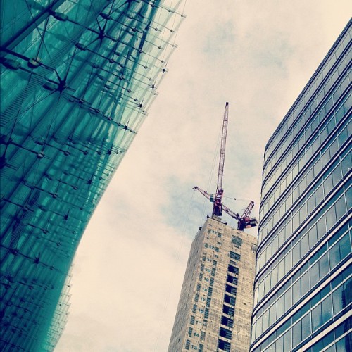 Cored • #canadasquare #canarywharf #eastlondon #london #england #greatbritain #unitedkingdom #concrete #core #cranes #underconstruction #glass #steel #wave #reflection #transparent #skyscraper #architecture #whiteclouds #thebritishsummer #summer...