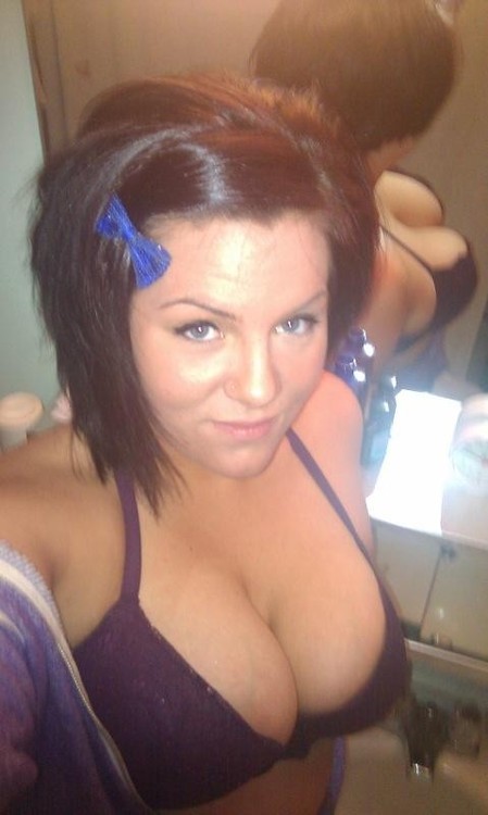 Hot chick with huge boobs selfshot.