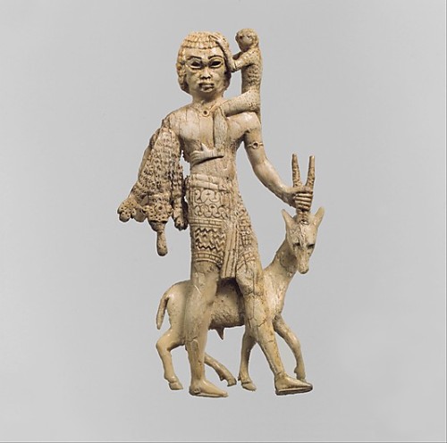 massarrah: omgthatartifact:Tribute-Bearer with an Oryx, Monkey, and Leopard Skin Neo-Assyrian, 8th c