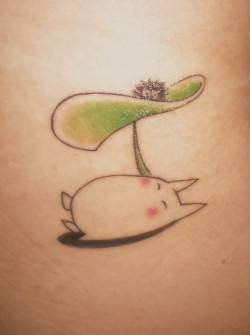 fuckyeahtattoos:  this is my “Chibi Totoro” tattoo. I was born in Japan and Totoro was the very first movie I ever saw and 20 years later is still one of my favorite movies.  