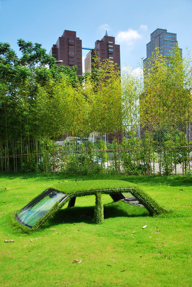 the-iridescence:  Buried vehicles being reclaimed by nature at CMP Block in Taiwan.