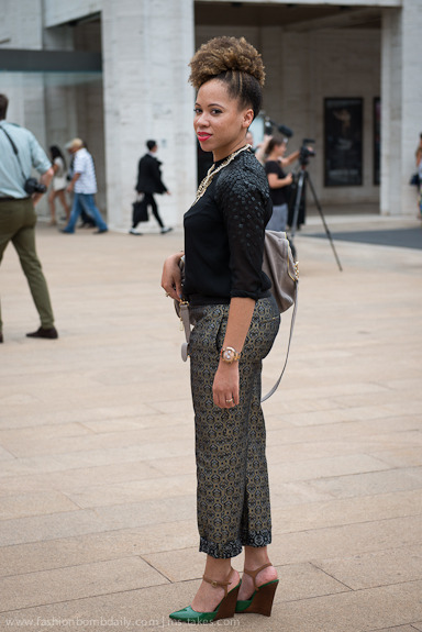 ecstasymodels:Tovah looks chic in wedges and printed pants, topped off by a slick updo.Black Girls K