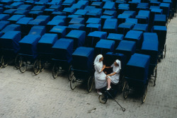  Two nurses take a break. FRANCE. Lourdes.