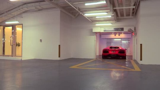  This is how millionaires park their cars in high-rise apartments.  fucking boss!