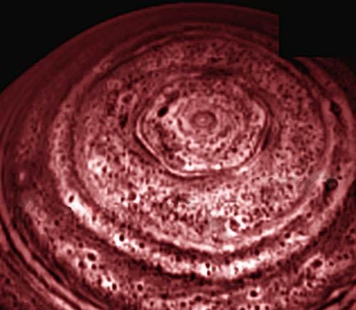 A bizarre six-sided feature encircling the north pole of Saturn near 78 degrees north latitude has b