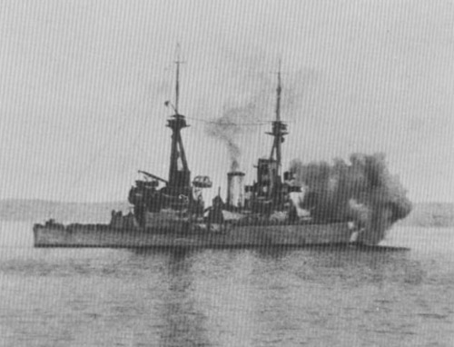 The HMS Inflexible bombards Turkish positions.
