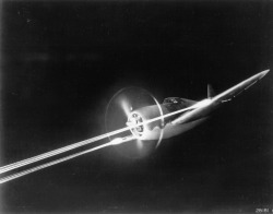 Republic P-47 Thunderbolt firing its M2 machine guns during night gunnery