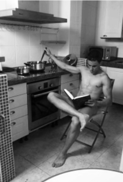 thadsthoughts:  Naked (and reading) in the kitchen. 