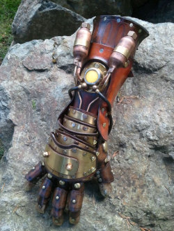 adragonstale:  http://www.etsy.com/listing/109113714/steampunk-equalist-glove-arm-armor