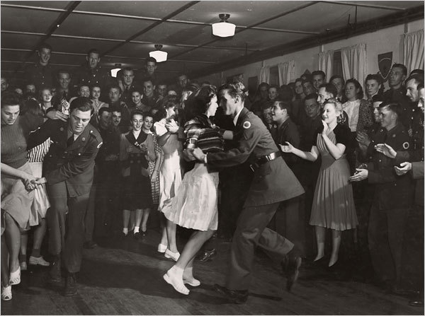  Soldiers and their girls jitterbug at a National Guard service club in Hattiesburg,