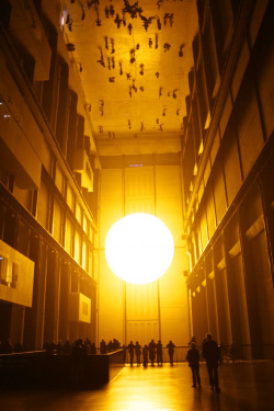free-parking:  Olafur Eliasson, The Weather Project  In this installation, The Weather Project, representations of the sun and sky dominate the expanse of the Turbine Hall. A fine mist permeates the space, as if creeping in from the environment outside.