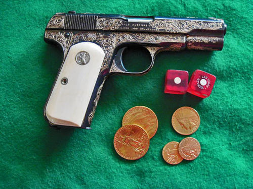 pimpingweapons: Colt Pocket Hammerless, engraved and with custom ivory grips. Found here.