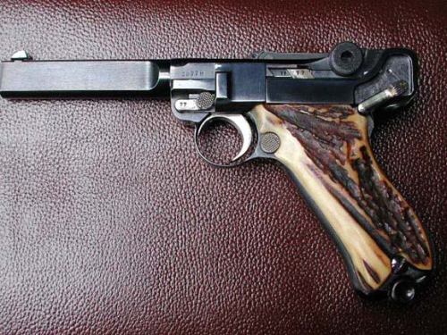 pimpingweapons: Heavy-barrelled Luger target pistol with horn grips.