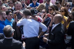 suitep:  Ricky Watson of Littleton, Colorado wipes tears from his eyes after he thanked President Barack Obama for repealing “Don’t Ask, Don’t Tell” at a campaign rally in Golden, Colorado, September 13. Watson was kicked out of the Air Force