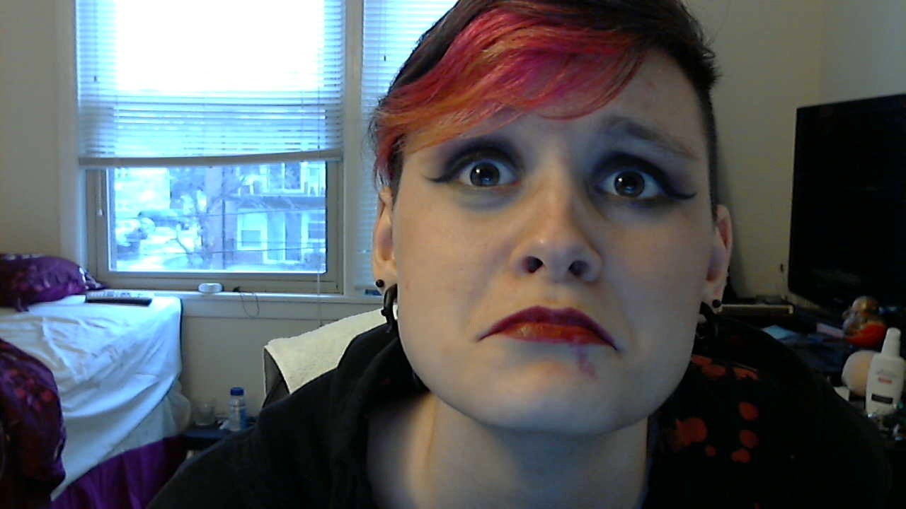 Eating a cannoli is tough work. And also ruined my lipstick.