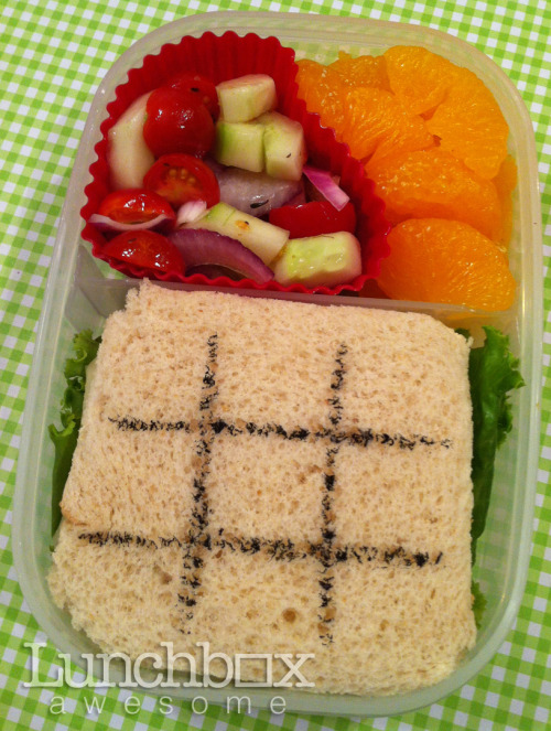 9-12-12
Running late again and at the last minute it sounded like a good idea to make the sandwich a tic-tac-toe board. Z said he and a friend played with the tomatoes and cucumbers and then each got to eat their respective parts! =)