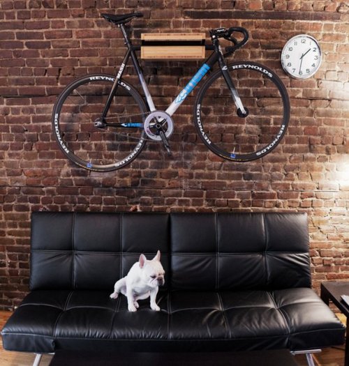surplus-mag:  Bike Shelf by Knife & Saw You’ve dropped way too much cash on that top of the line road bike not to show it off. Take it out of the garage and hang it like art with this bike shelf by Knife & Saw.  