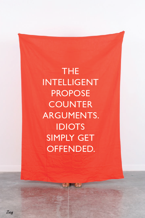 spookyburlesque:  ianbrooks:  Smartass Design by Shahir Zag Helvetica print on stock