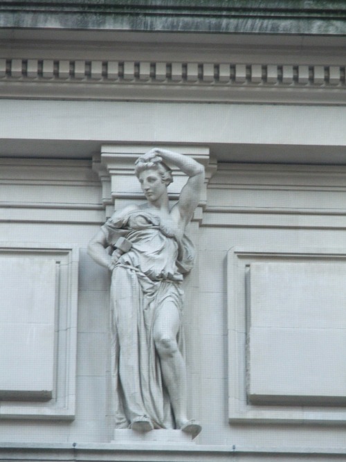 offthegridny:Closeup of statue along the top of the Metropolitan Museum of Art on Fifth Avenue