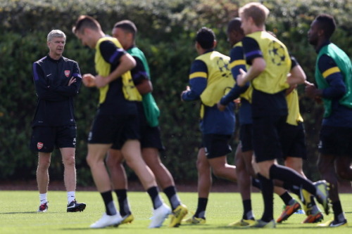 during a training session at London Colney on September 17, 2012 ahead of CL group stage match again