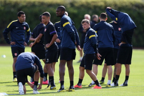 during a training session at London Colney on September 17, 2012 ahead of CL group stage match again