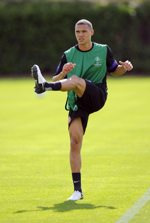 during a training session at London Colney on September 17, 2012 ahead of CL group stage match again