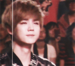 oh-luhans - Luhan trying hard not to cry.