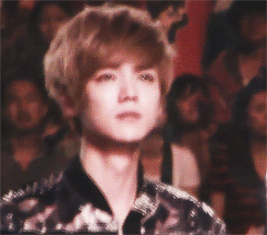 oh-luhans - Luhan trying hard not to cry.