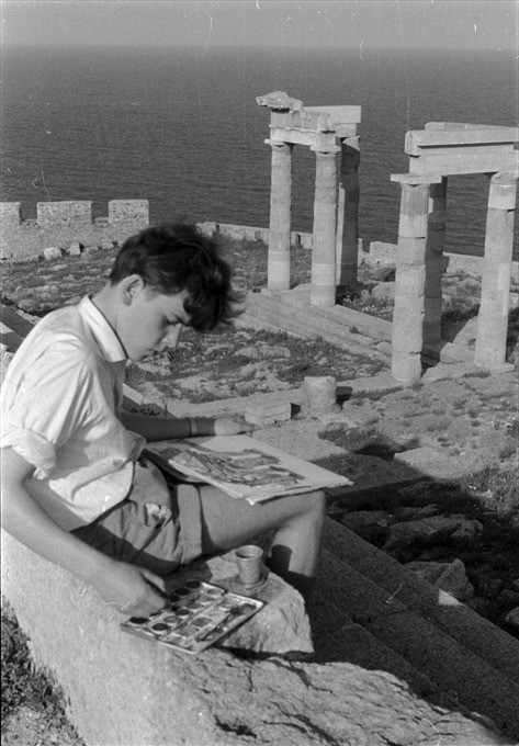 Boy painting a Greek temple Photographer and date unknown