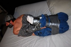 gaggedramdog:  All taped up and gagged! Love